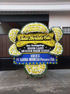 Papan Bunga Duka di Tangga Barito