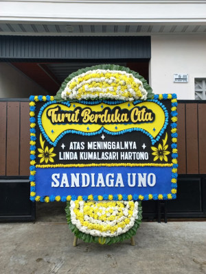 Papan Bunga Duka di Tangga Barito